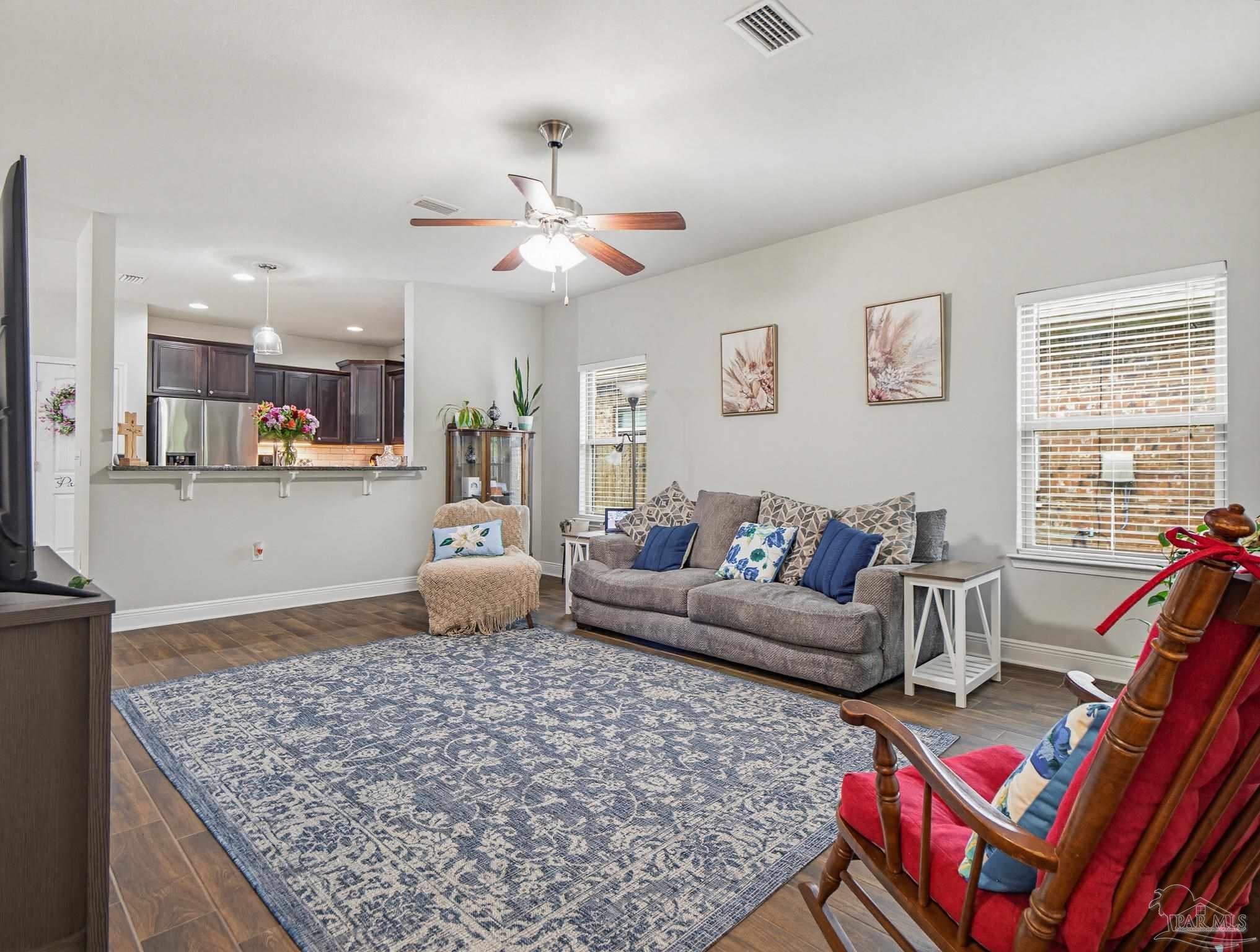 6294 Ladera Trail Pace, FL 32571 - Photo 4 of 50 a living room with furniture and kitchen view