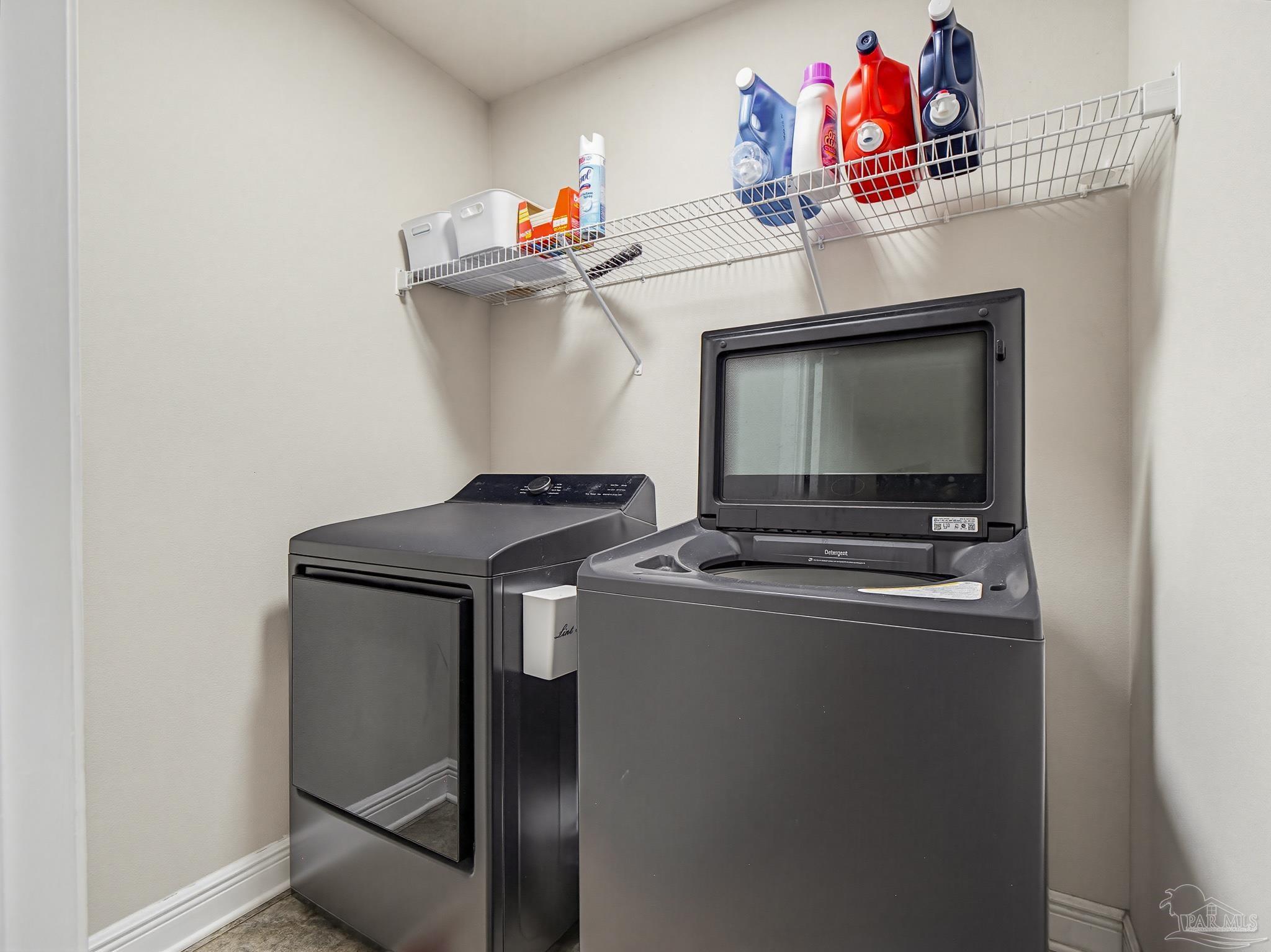 6294 Ladera Trail Pace, FL 32571 - Photo 41 of 50 a utility room with dryer and washer