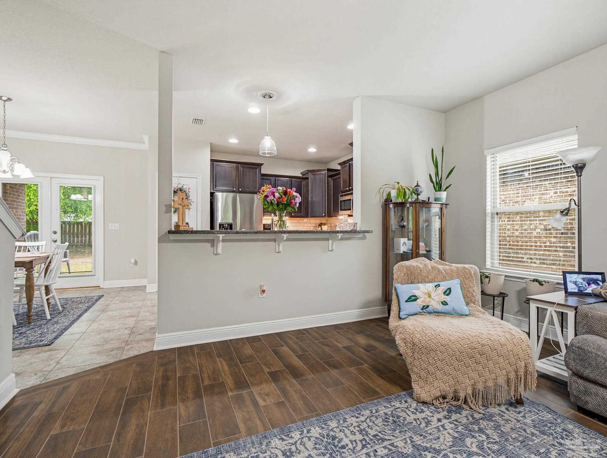 6294 Ladera Trail Pace, FL 32571 - Photo 8 of 50 a living room with furniture and a table