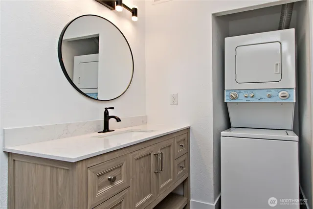 a bedroom with bed and a night stand