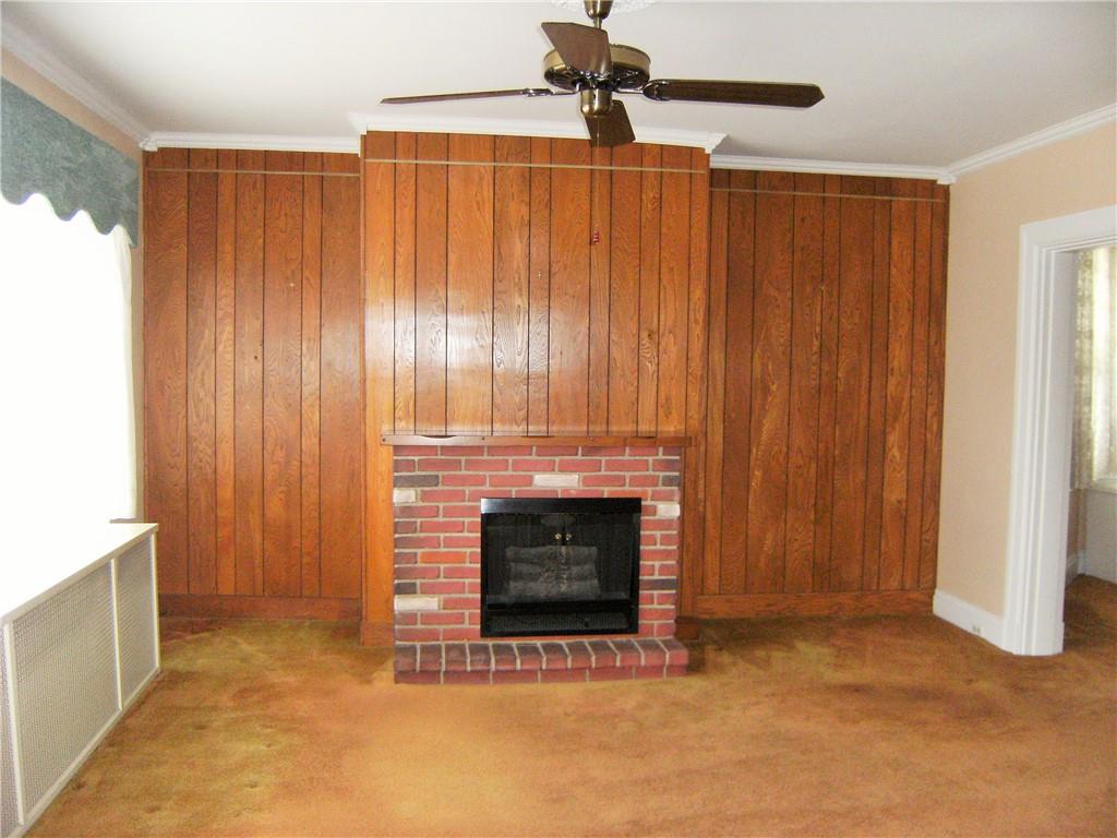 2733 Middletown Road Pittsburgh, PA 15205 - Photo 3 of 25 Living Room With Decorative Fireplace - Hardwood Floors Below Carpet
