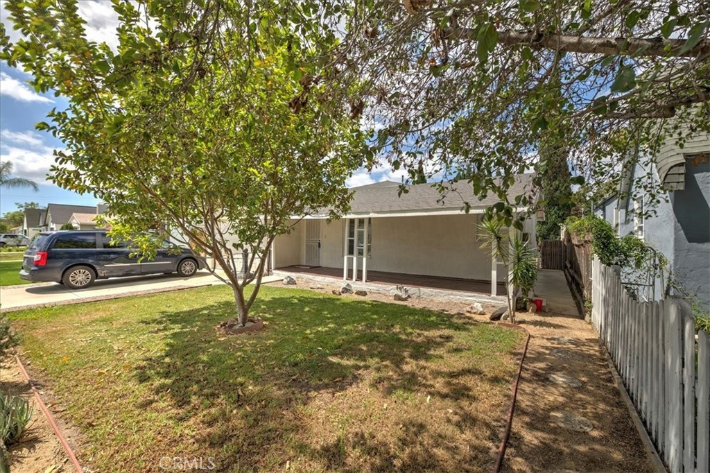 1128 South Parton Street Santa Ana, CA 92707 - Photo 30 of 32 a house with trees in front of it