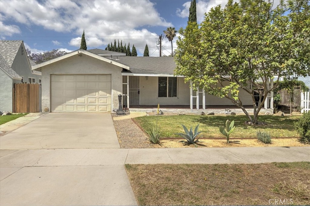 1128 South Parton Street Santa Ana, CA 92707 - Photo 32 of 32 a view of a house with a yard