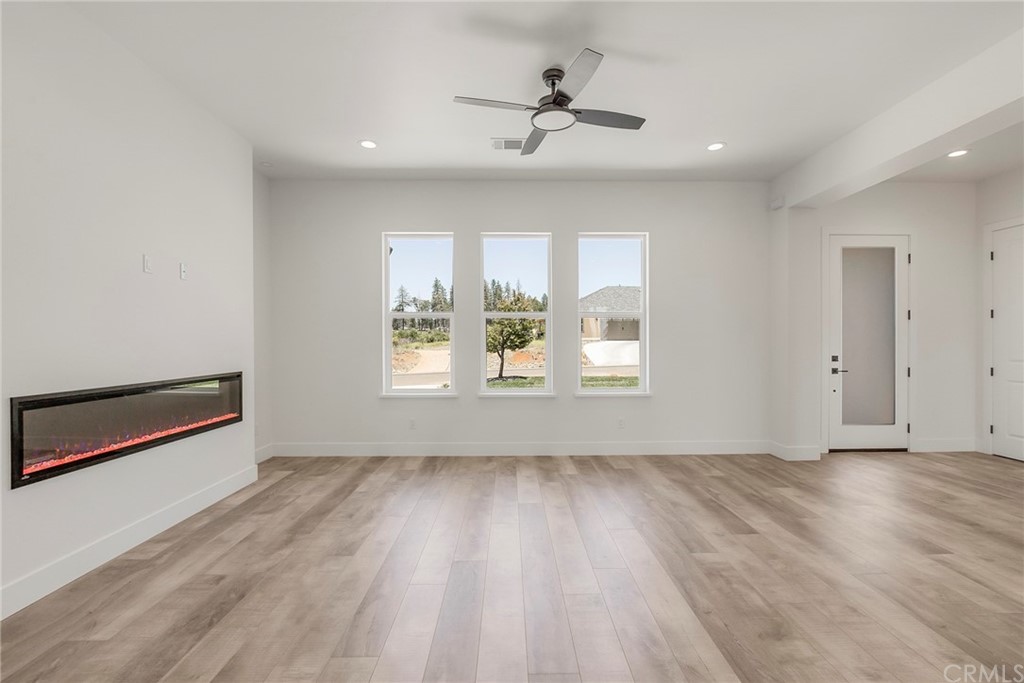 1830 Apple View Way Paradise, CA 95969 - Photo 13 of 75 wooden floor in an empty room with a window