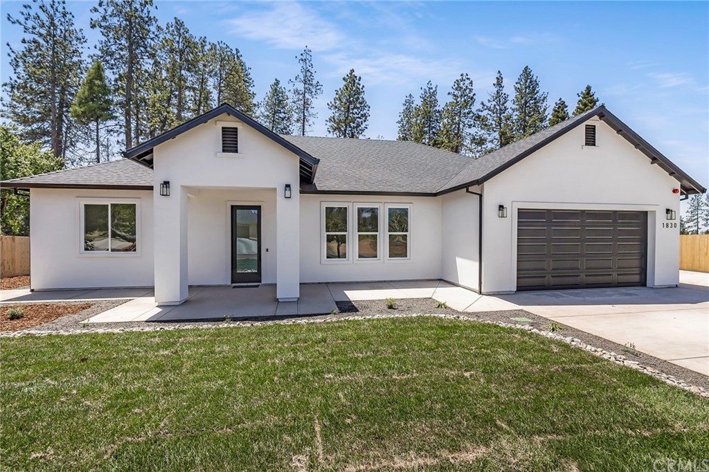 1830 Apple View Way Paradise, CA 95969 - Photo 2 of 75 a front view of a house with a yard and garage