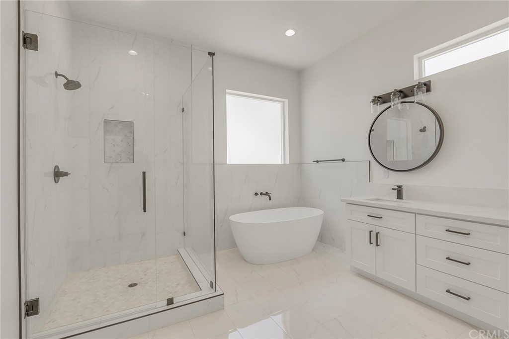 1830 Apple View Way Paradise, CA 95969 - Photo 33 of 75 a bathroom with a double vanity sink mirror and shower