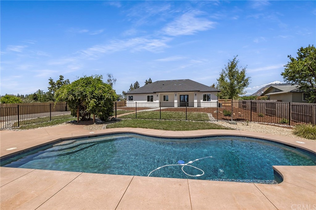 1830 Apple View Way Paradise, CA 95969 - Photo 63 of 75 a view of swimming pool with outdoor seating and house in the background