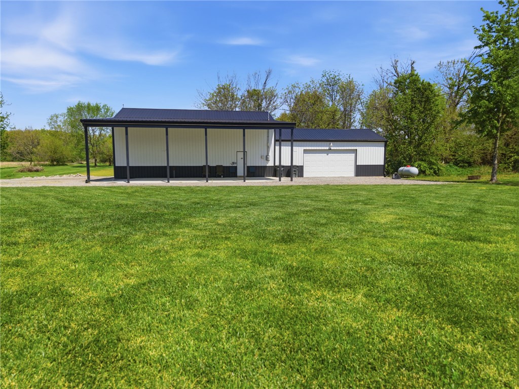 1602 Westboro Road Blanchester, OH 45107 - Photo 63 of 81 This spacious property offers a barn with an attached garage, perfect for storage or hobbies.