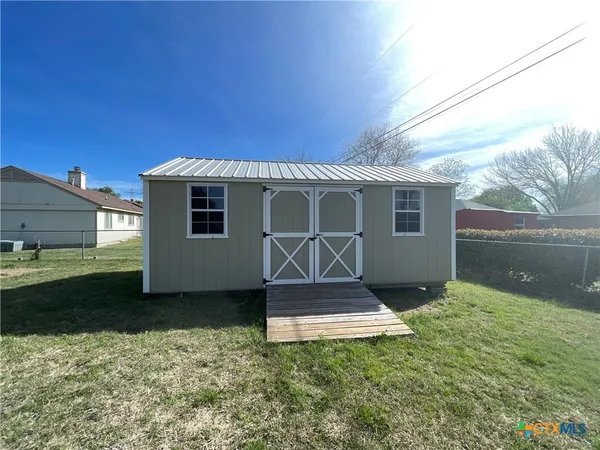 a view of a room with furniture