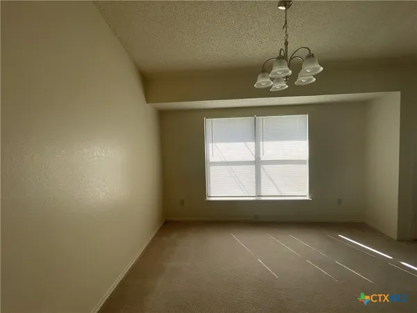 en empty room with windows