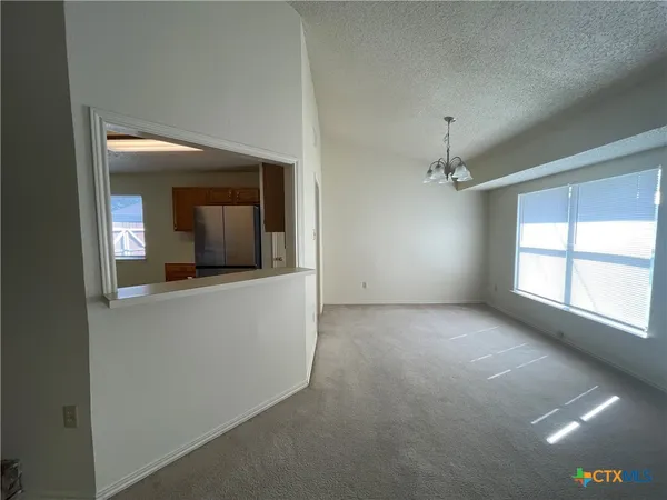 a view of a room that has a window