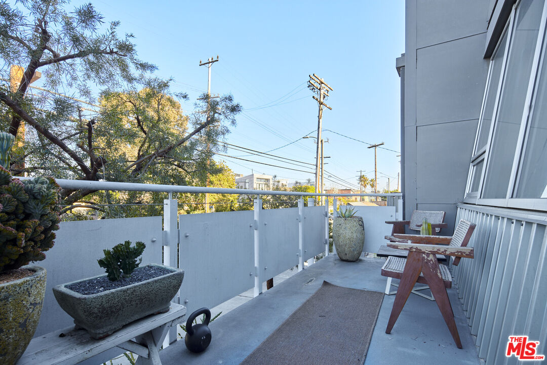 615 Hampton Drive, Unit B201 Venice, CA 90291 - Photo 7 of 39 a view of a balcony with chairs