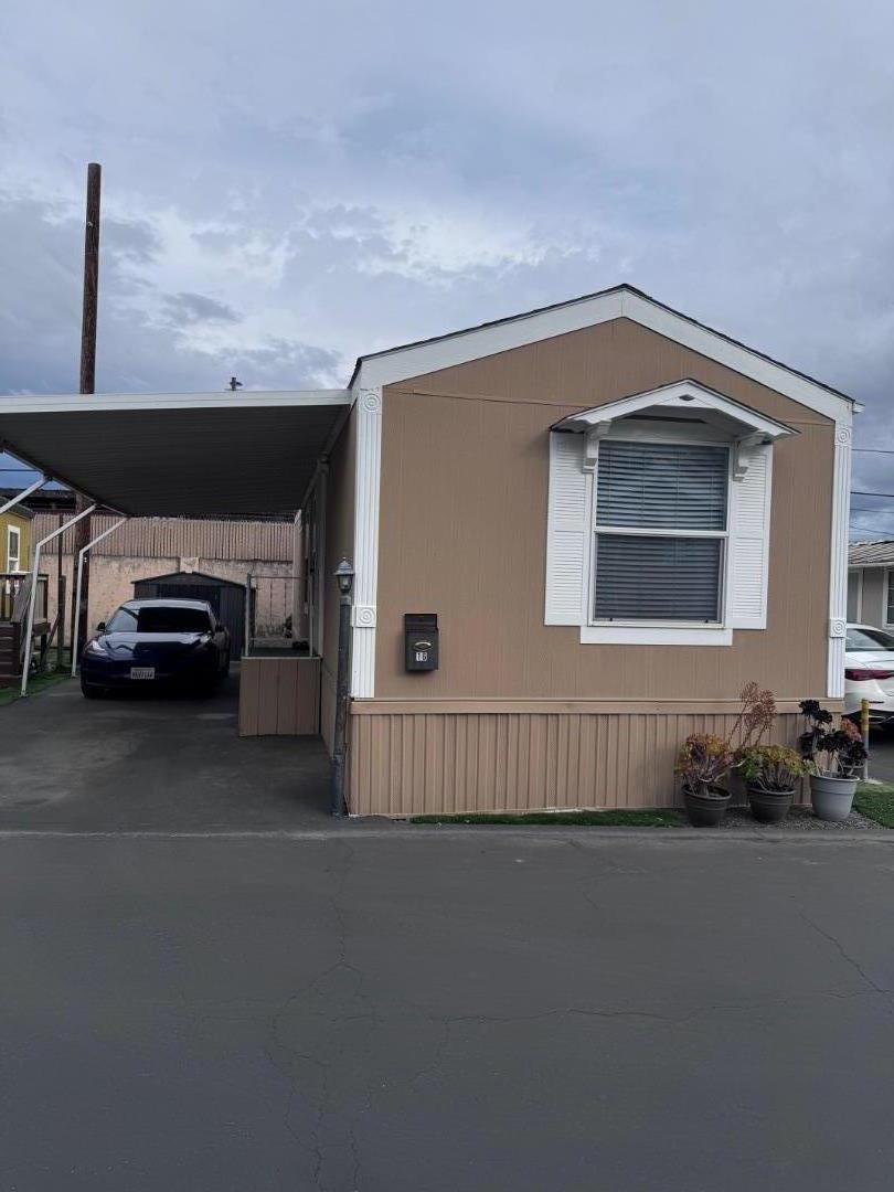 4320 Monterey Road, Unit 16 San Jose, CA 95111 - Photo 1 of 13 a car parked in front of a house