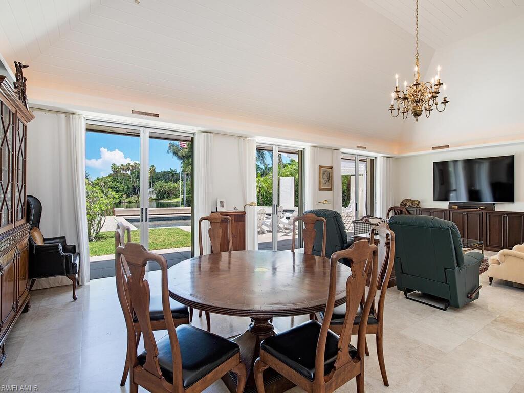 2680 Lantern Lane Naples, FL 34102 - Photo 6 of 24 a view of a dining room with furniture window and outside view