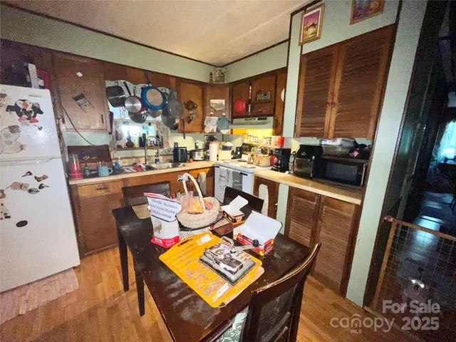 a view of workspace with wooden floor