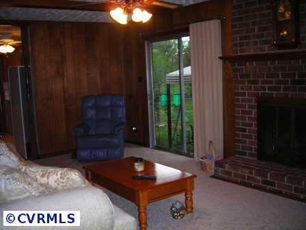 1206 Covington Road Colonial Heights, VA 23834 - Photo 4 of 8 Other - family room brick gas fp and doors opening to patio & back yard