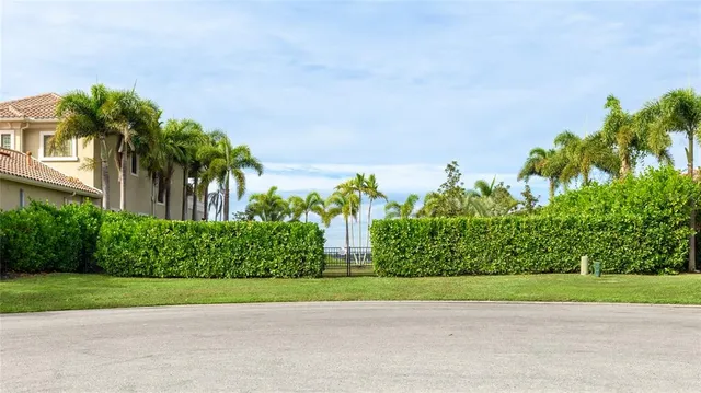 a view of a multi story building with a yard