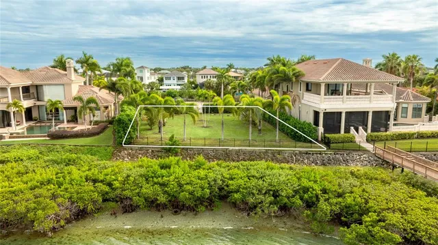 a aerial view of a house with a yard