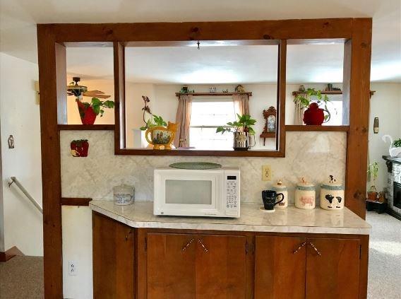 33 Montgomery Road Windham, ME 04062 - Photo 13 of 29 The divider wall offers many...
