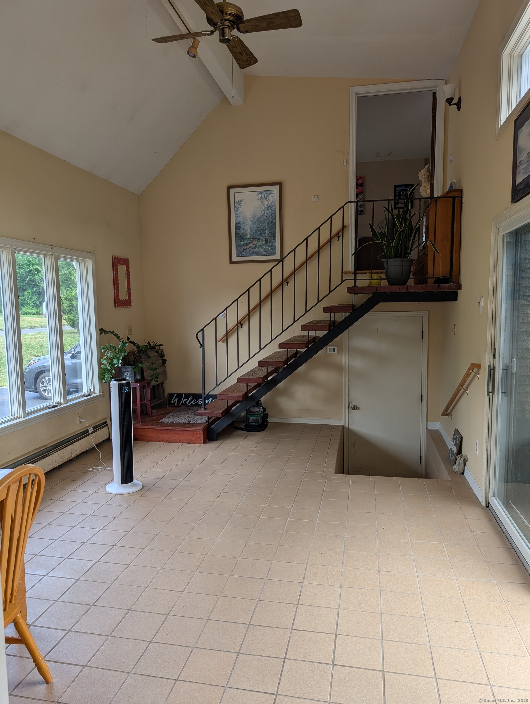 2805 Boston Post Road Guilford, CT 06437 - Photo 15 of 35 a view of a livingroom with furniture and a staircase