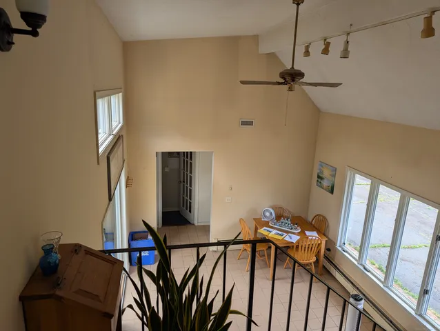 a view of a hallway with workspace
