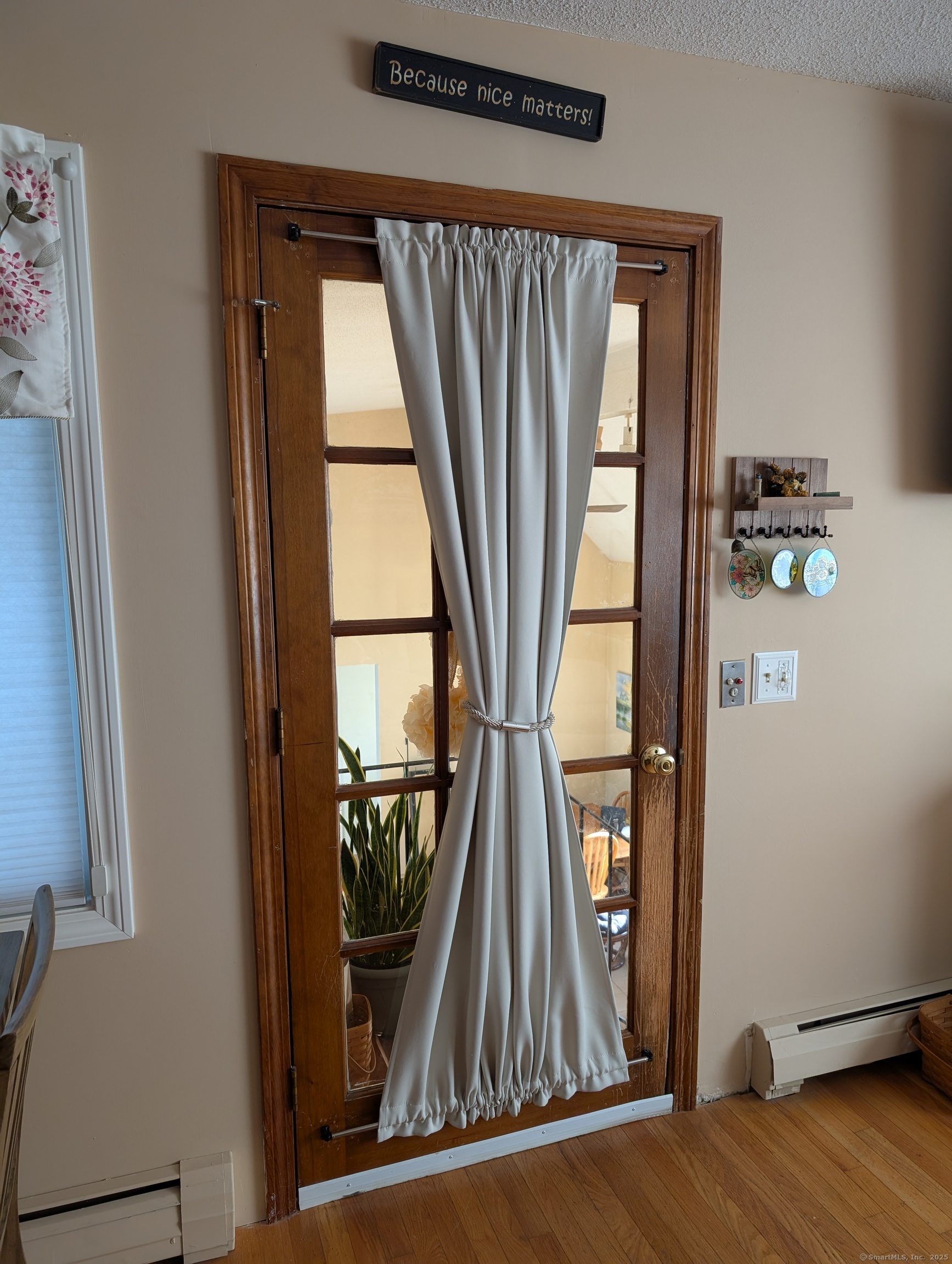2805 Boston Post Road Guilford, CT 06437 - Photo 27 of 35 a view of front door with wooden floor