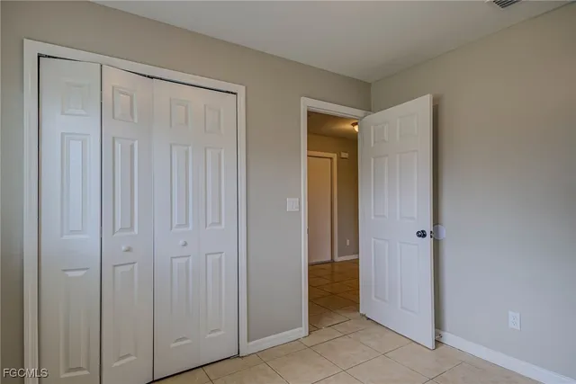 a view of a hallway with closet area