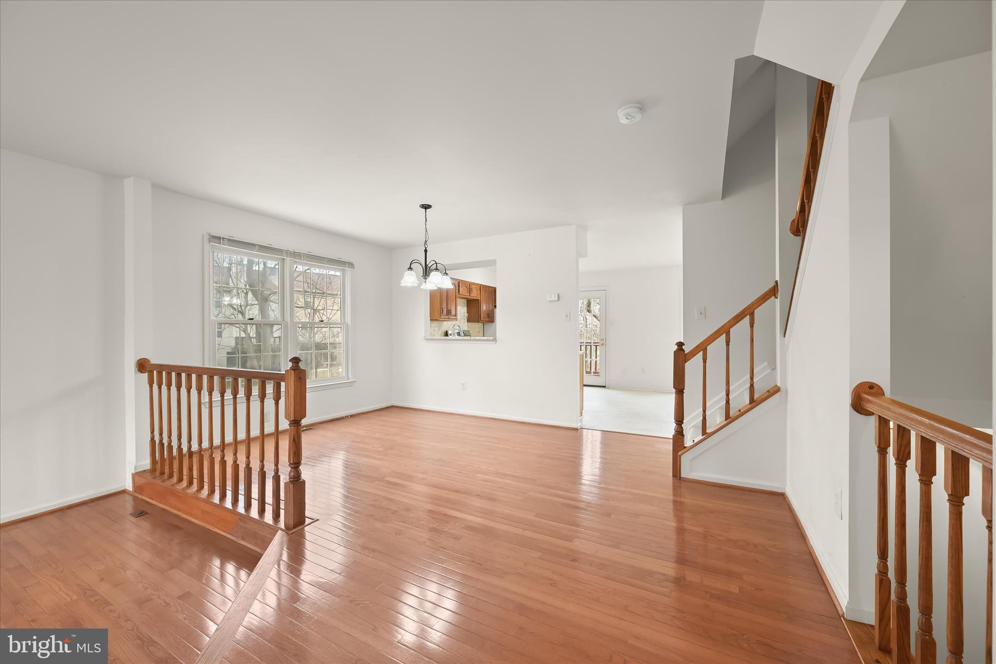 4750 Rams Horn Row Ellicott City, MD 21042 - Photo 13 of 54 a view interior of a house with wooden floor and windows