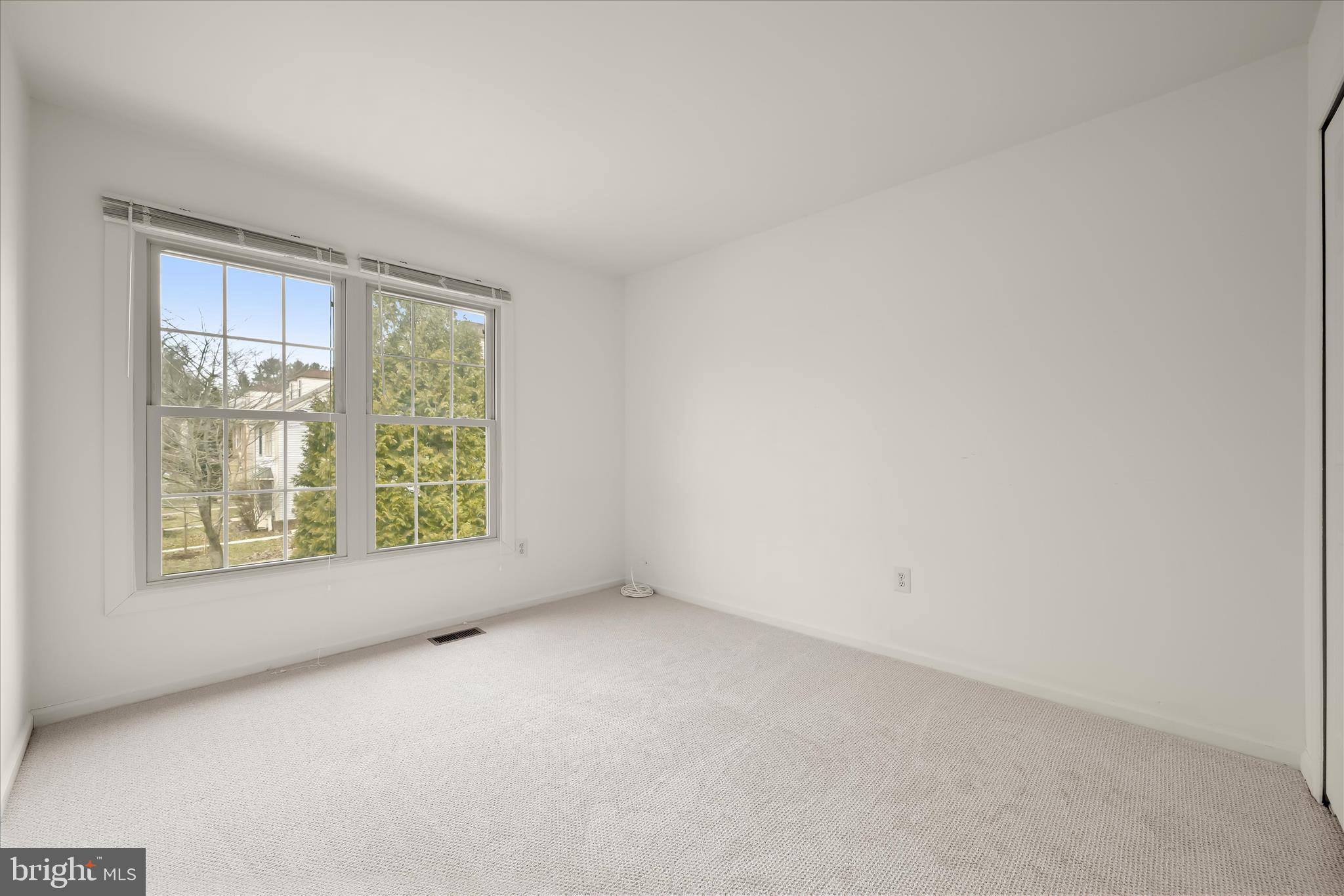 4750 Rams Horn Row Ellicott City, MD 21042 - Photo 34 of 54 an empty room with windows