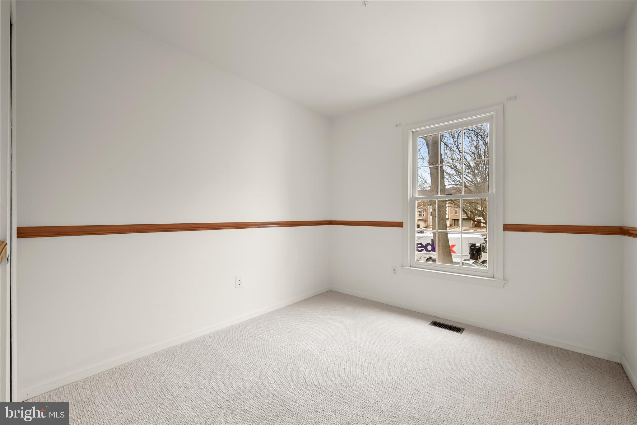 4750 Rams Horn Row Ellicott City, MD 21042 - Photo 36 of 54 an empty room with windows