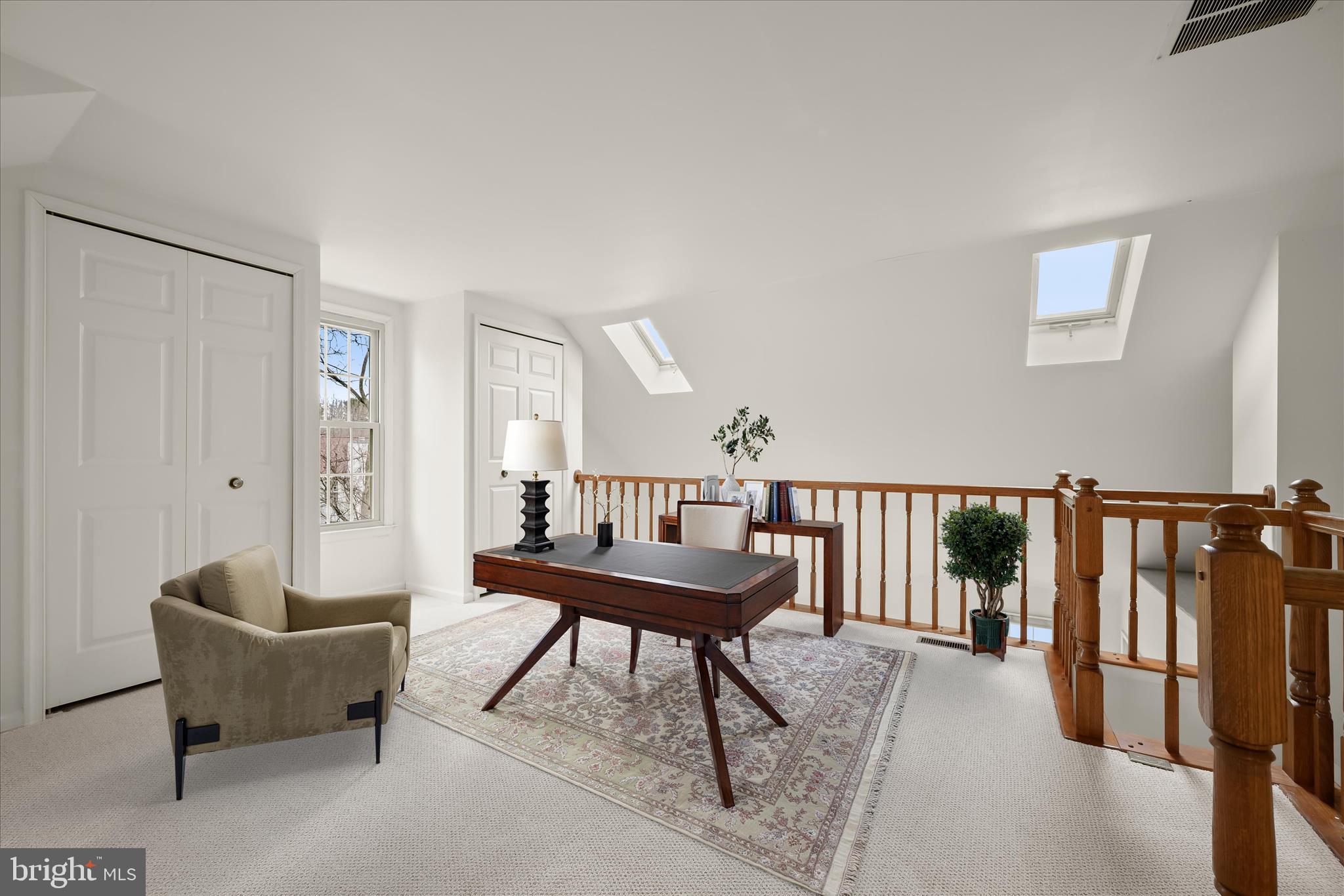 4750 Rams Horn Row Ellicott City, MD 21042 - Photo 5 of 54 a living room with furniture a rug and a window