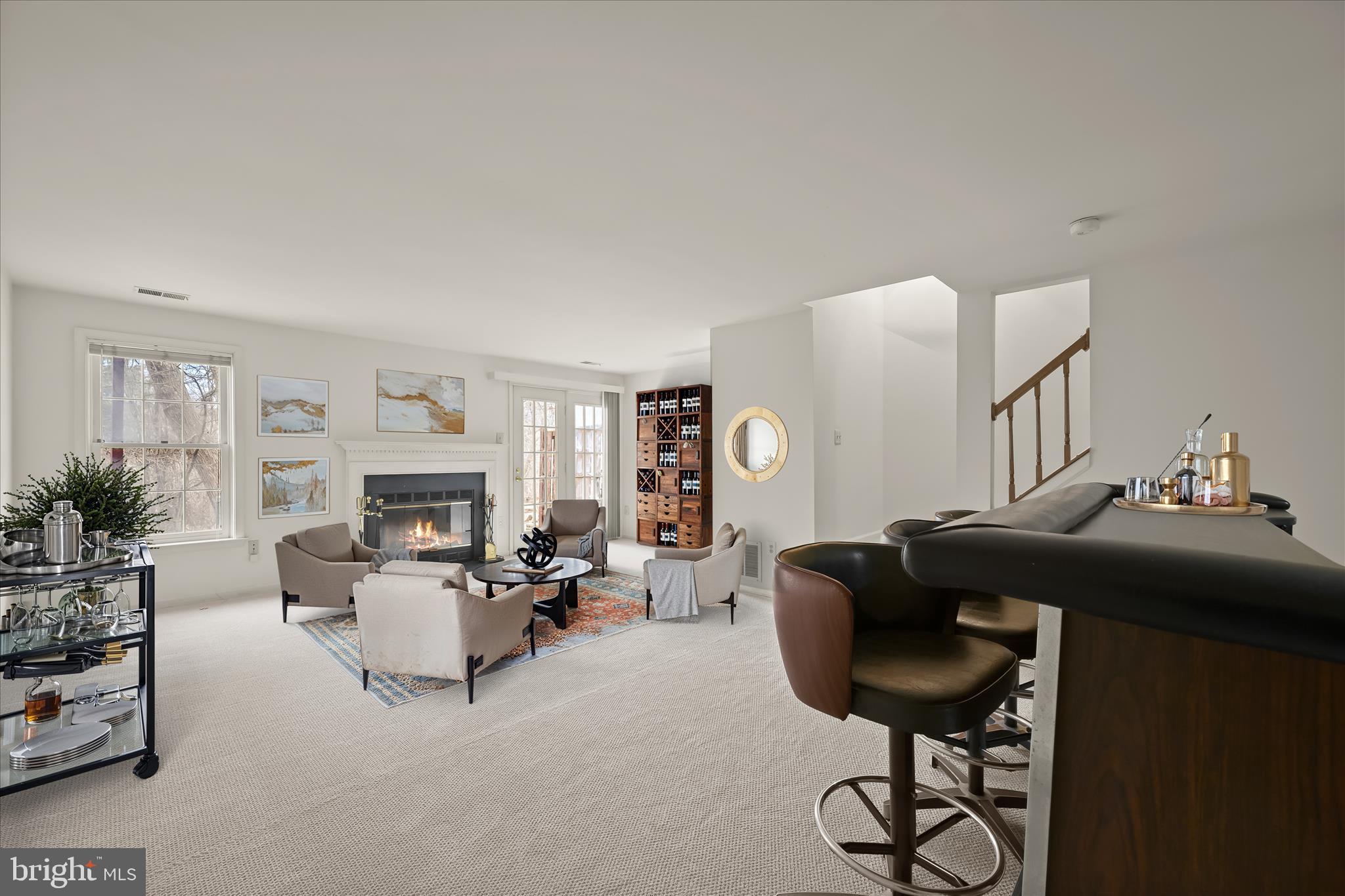 4750 Rams Horn Row Ellicott City, MD 21042 - Photo 6 of 54 a living room with furniture and a fireplace
