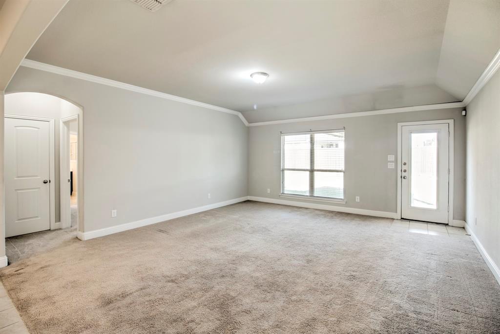1925 Alton Way Aubrey, TX 76227 - Photo 14 of 32 an empty room with windows