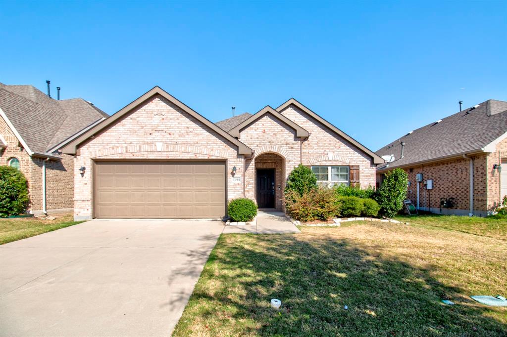 1925 Alton Way Aubrey, TX 76227 - Photo 2 of 32 a front view of a house with a yard and garage