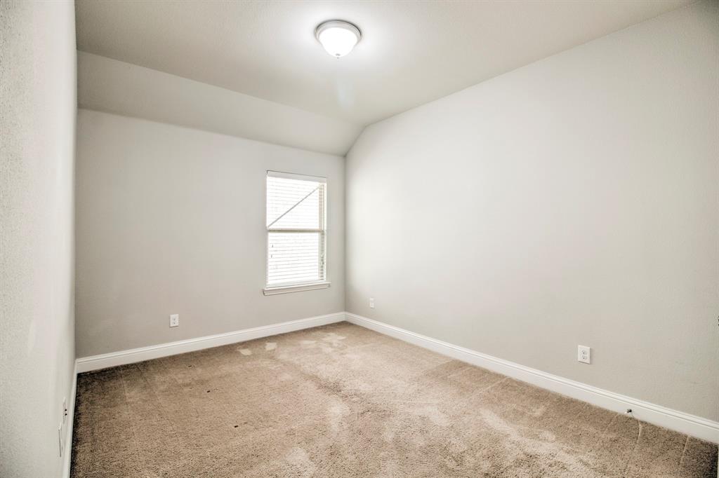1925 Alton Way Aubrey, TX 76227 - Photo 23 of 32 an empty room with a window