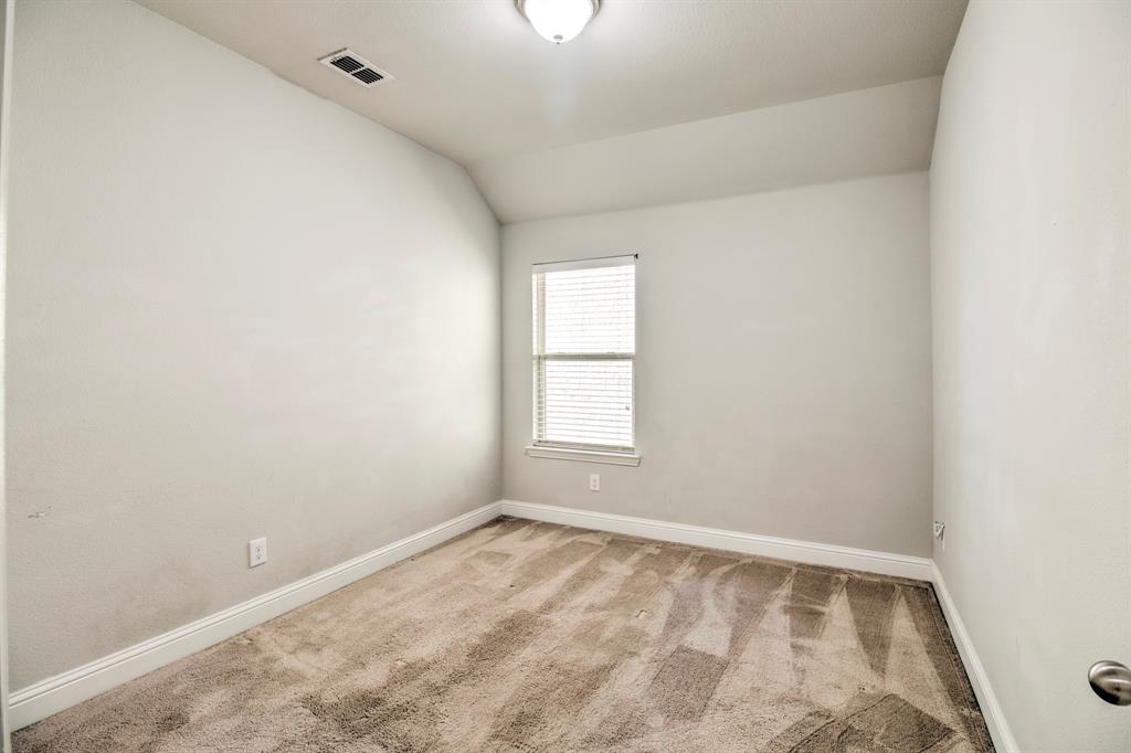 1925 Alton Way Aubrey, TX 76227 - Photo 25 of 32 an empty room with a window