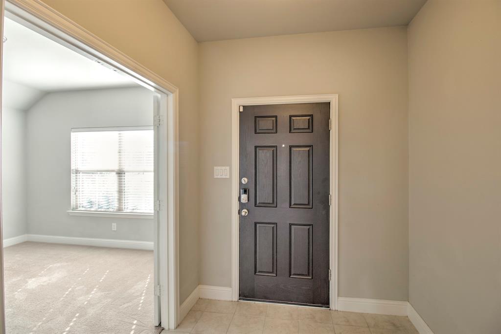 1925 Alton Way Aubrey, TX 76227 - Photo 5 of 32 an empty room with windows