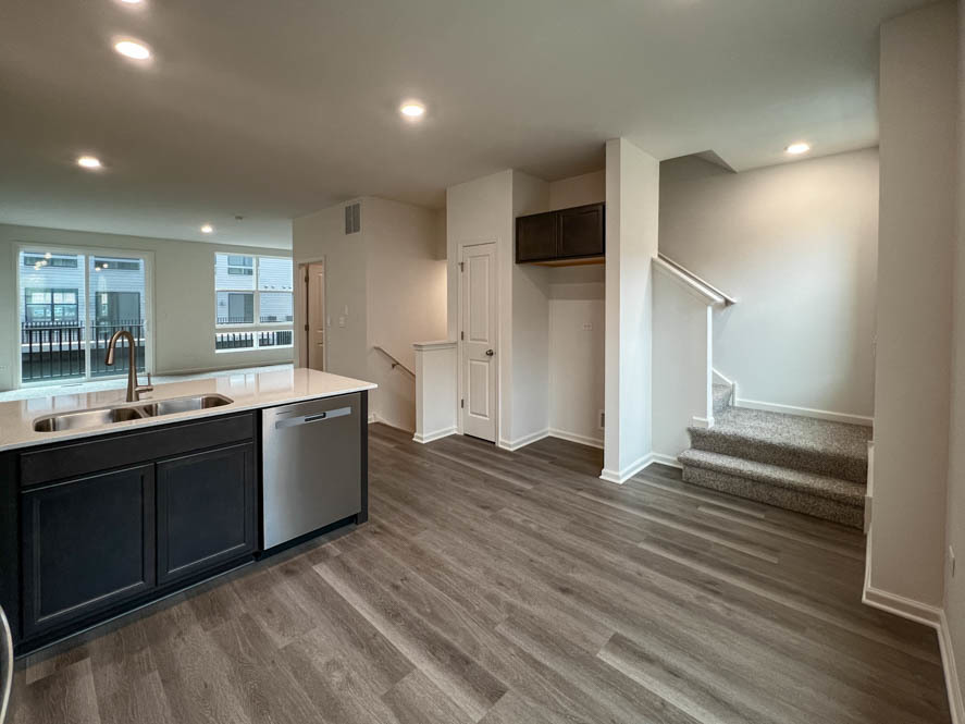 392 Summit Circle Lombard, IL 60148 - Photo 6 of 61 a large room with a lot of counter space and wooden floor
