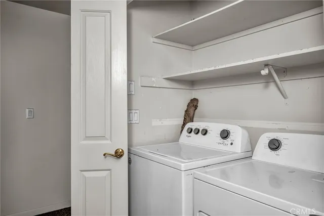 a view of utility room with washer and dryer