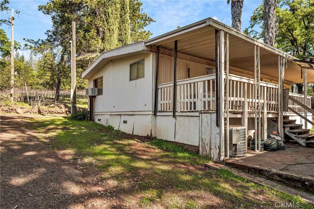 13988 Noble Ranch Road Lower Lake, CA 95457 - Photo 27 of 36 a view of a house with a yard