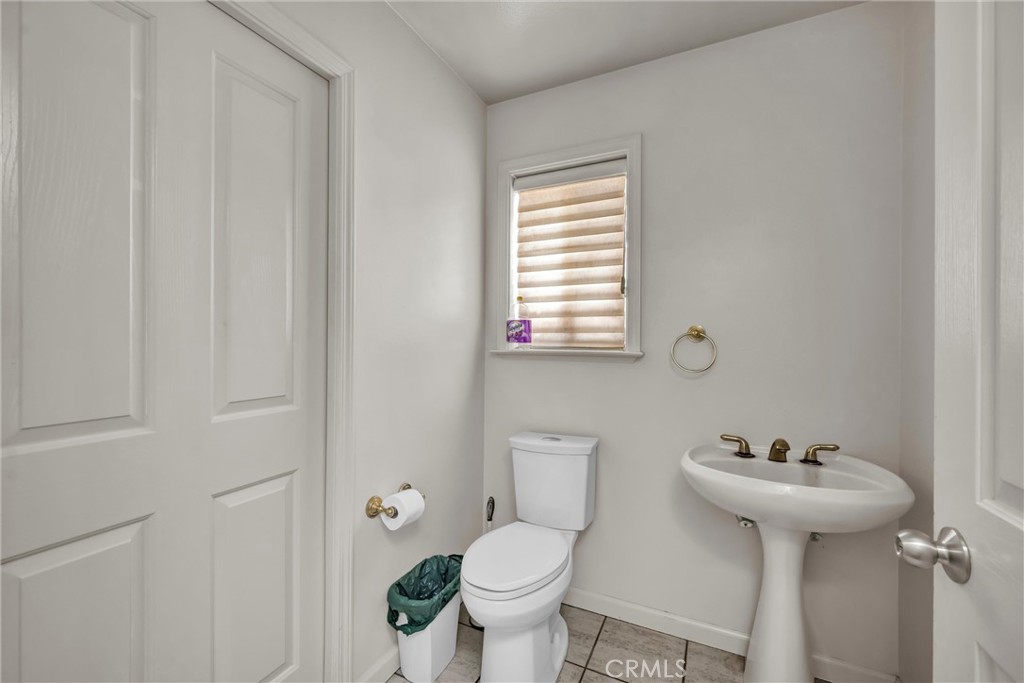 13988 Noble Ranch Road Lower Lake, CA 95457 - Photo 6 of 36 a bathroom with a sink toilet and a mirror