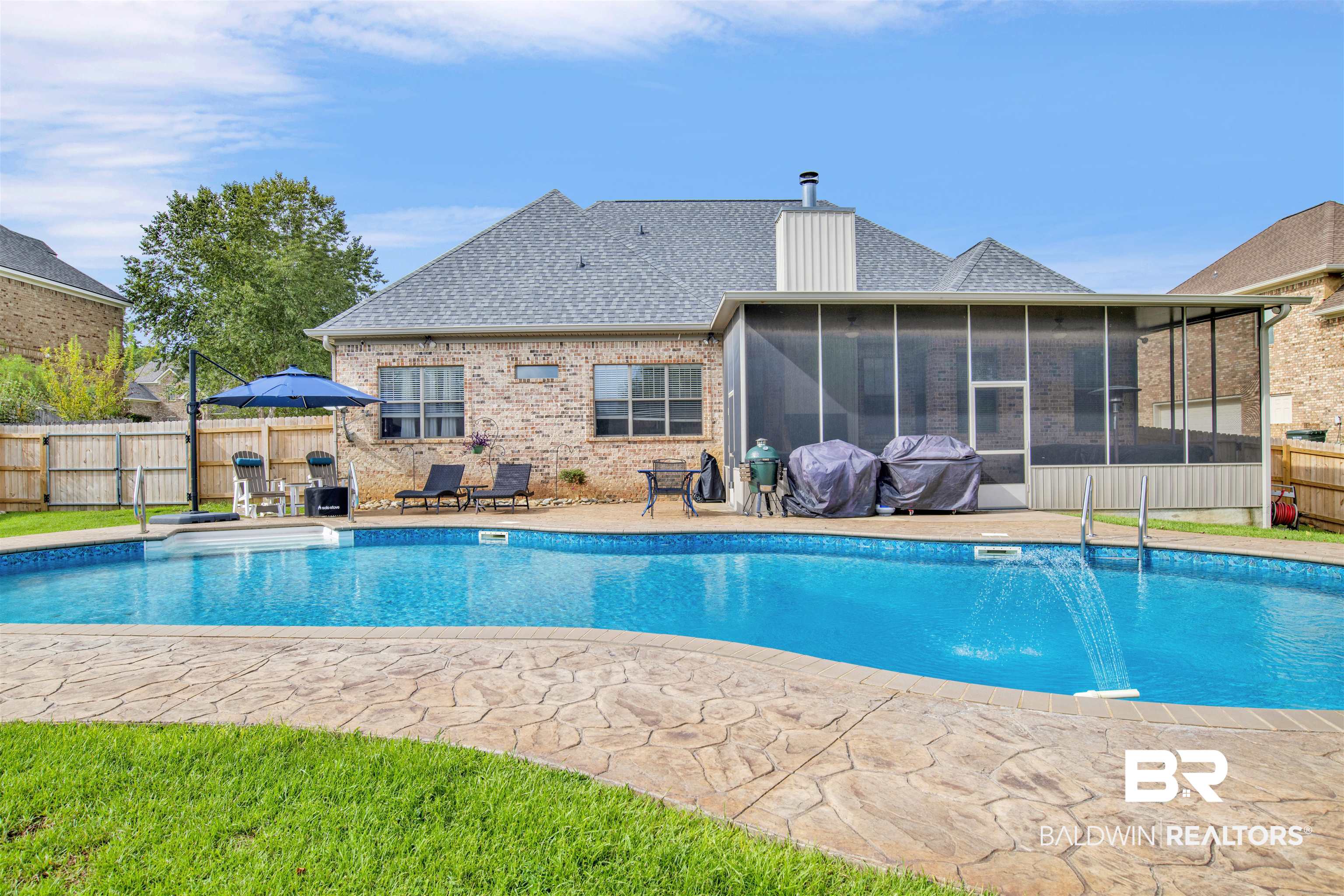 12418 Cambron Trail Daphne, AL 36527 - Photo 42 of 44 View of swimming pool with grilling area, a sunroom, a patio, and pool water feature