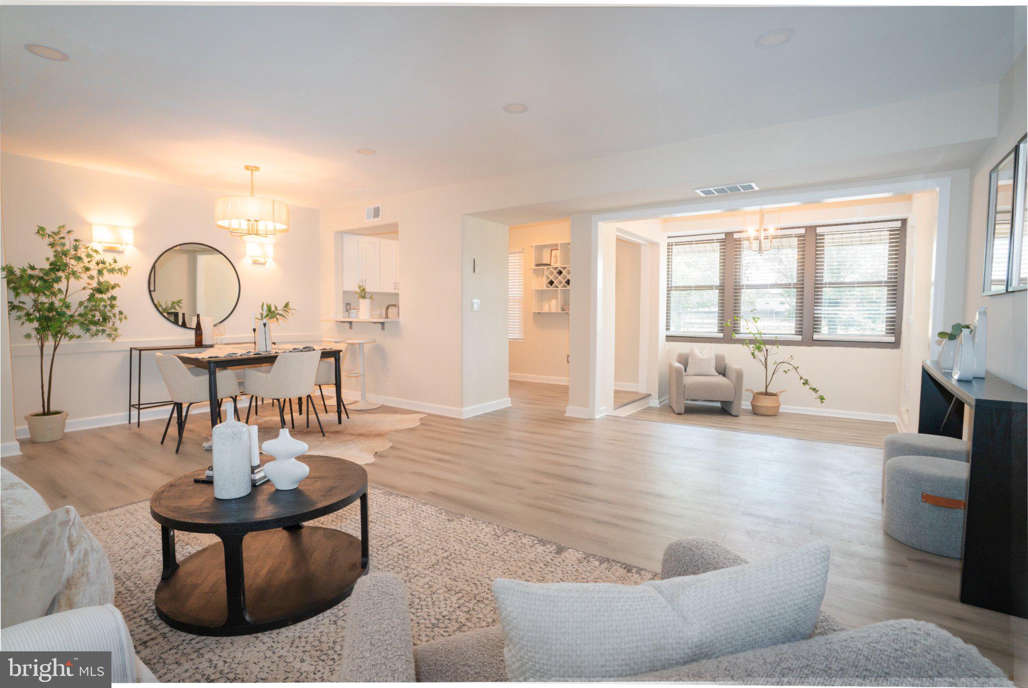 5860 Thunder Hill Road, Unit C1 Columbia, MD 21045 - Photo 1 of 22 Bright and airy open living space.