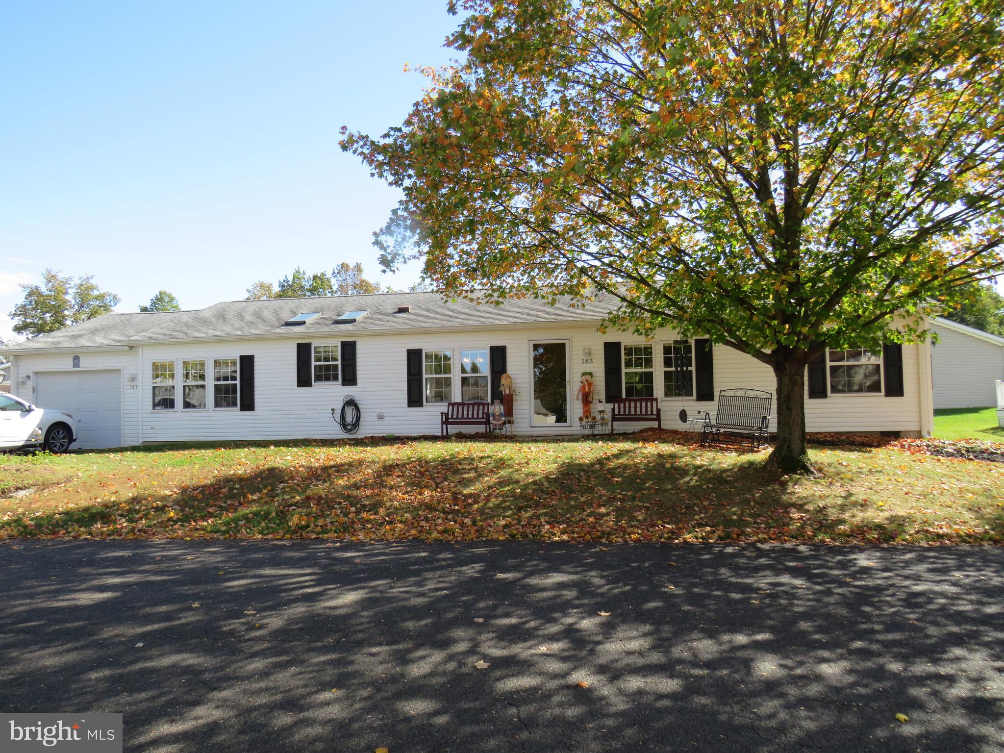 183 Spring Meadow Circle New Hope, PA 18938 - Photo 1 of 37 a front view of a house with a yard covered with trees