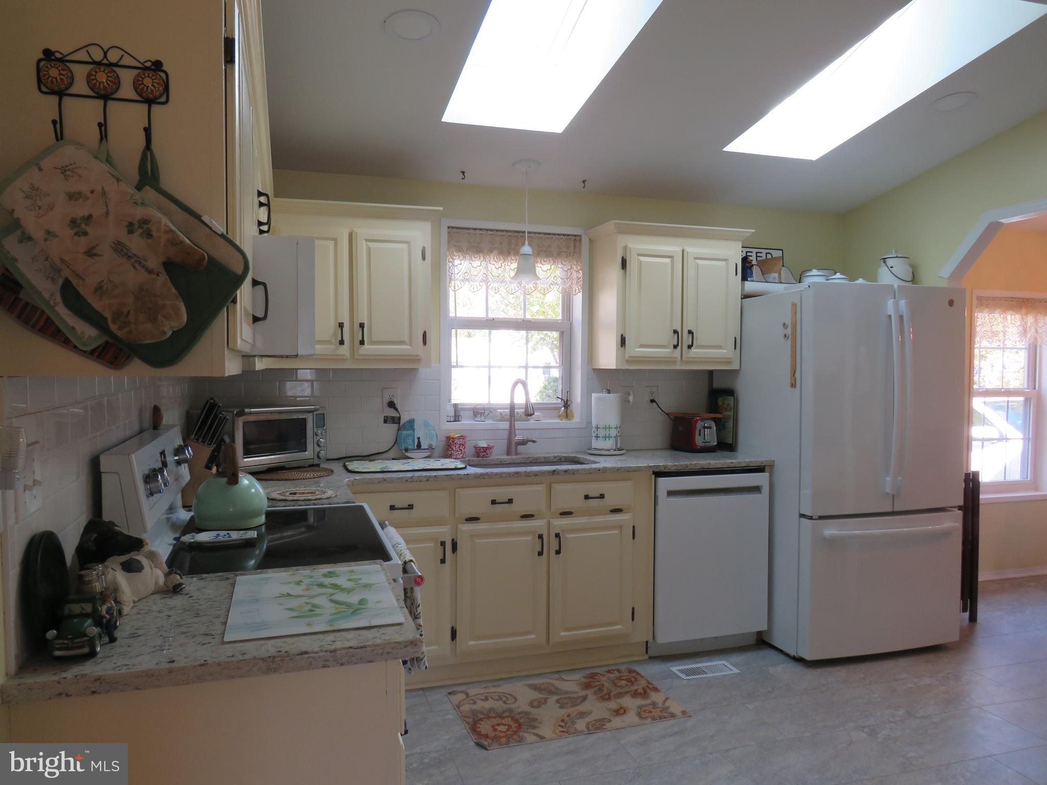 183 Spring Meadow Circle New Hope, PA 18938 - Photo 11 of 37 a kitchen with a sink appliances and cabinets