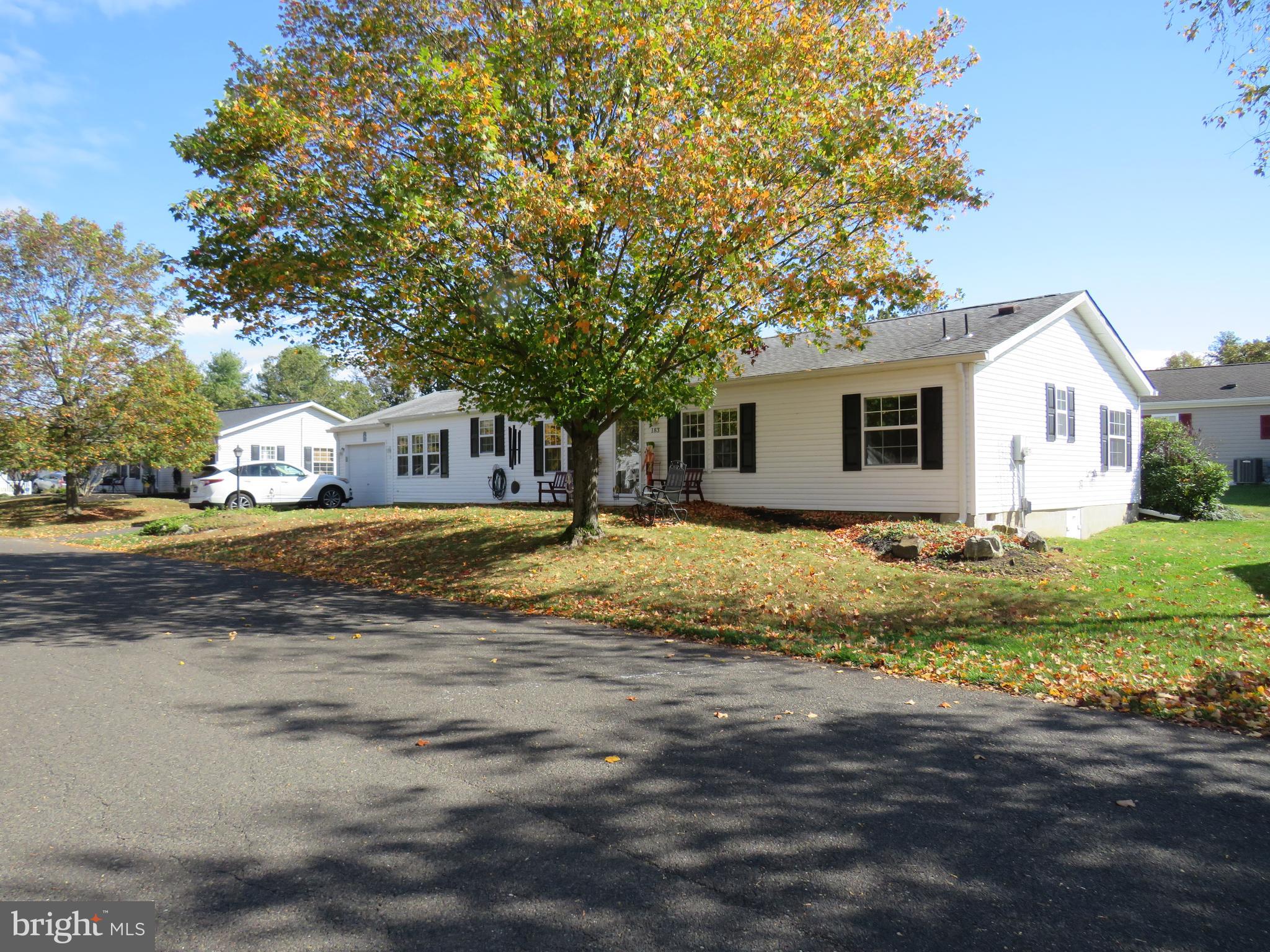 183 Spring Meadow Circle New Hope, PA 18938 - Photo 2 of 37 a house view with swimming pool in front of it