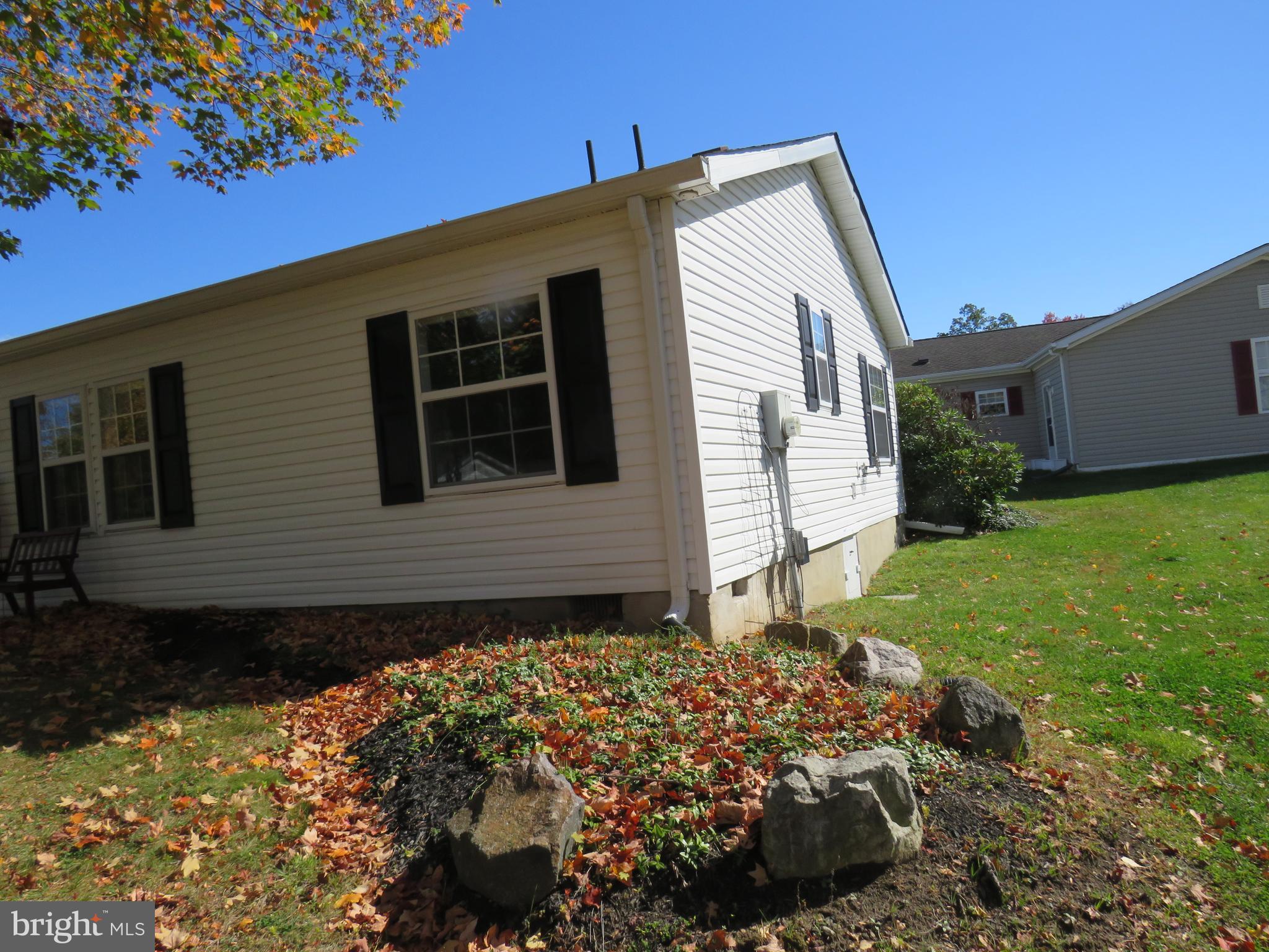183 Spring Meadow Circle New Hope, PA 18938 - Photo 33 of 37 a front view of a house with garden