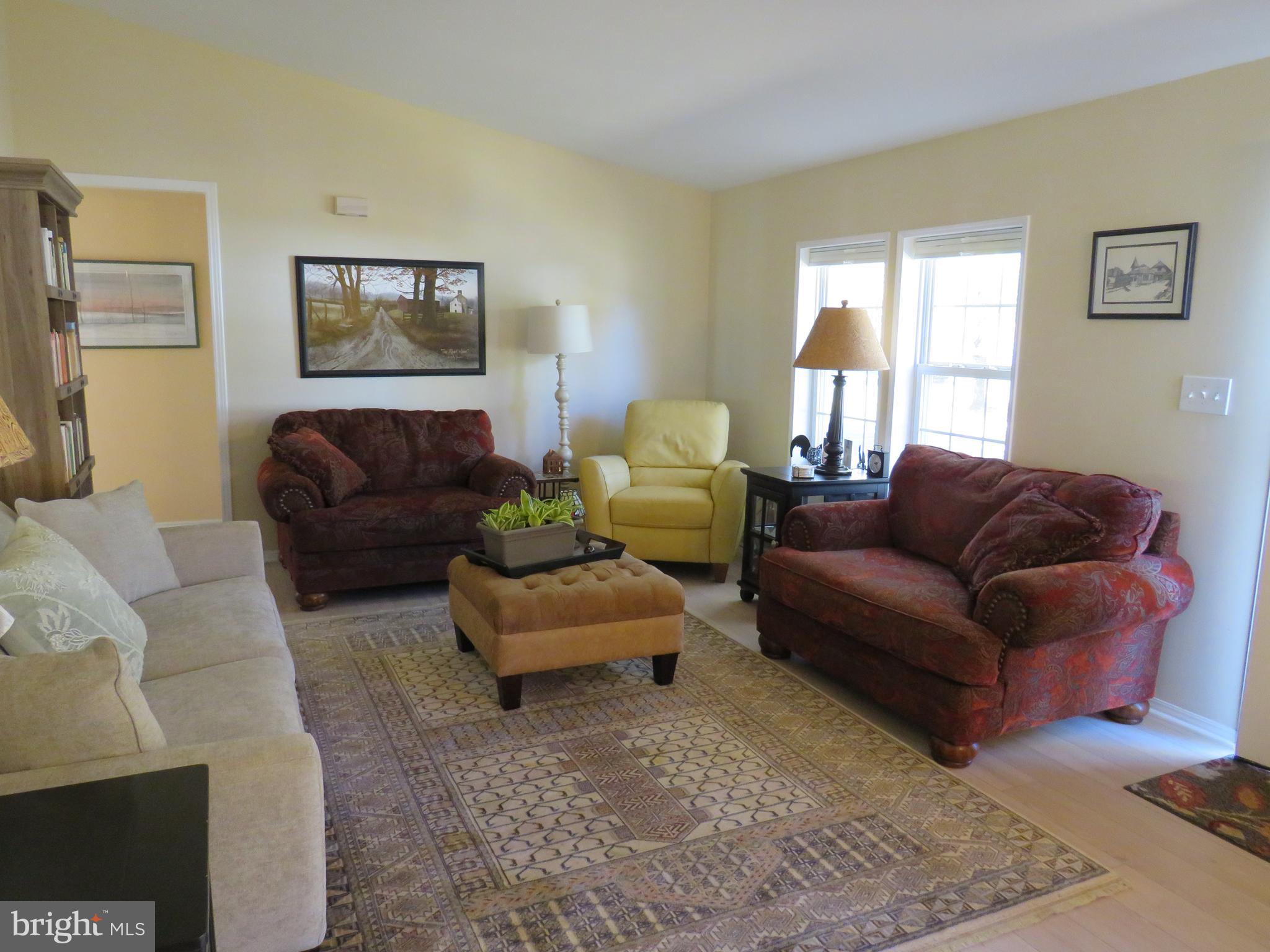 183 Spring Meadow Circle New Hope, PA 18938 - Photo 4 of 37 a living room with furniture or couch and a window