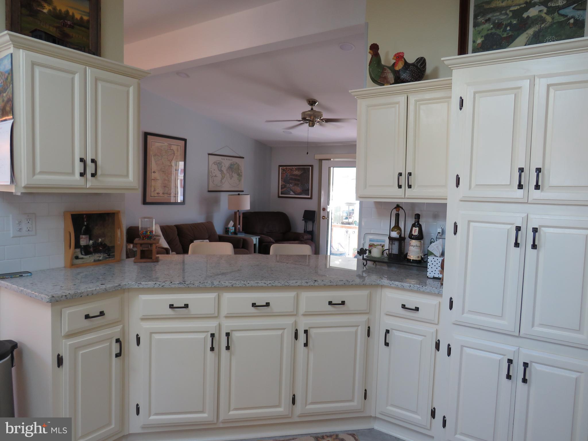 183 Spring Meadow Circle New Hope, PA 18938 - Photo 10 of 37 a kitchen with white cabinets and sink