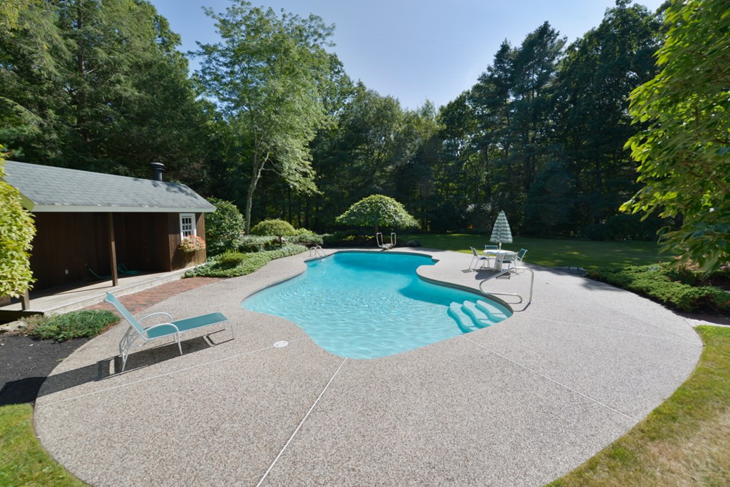 51 Cornell Road Needham, MA 02492 - Photo 8 of 8 a view of a house with backyard and a garden